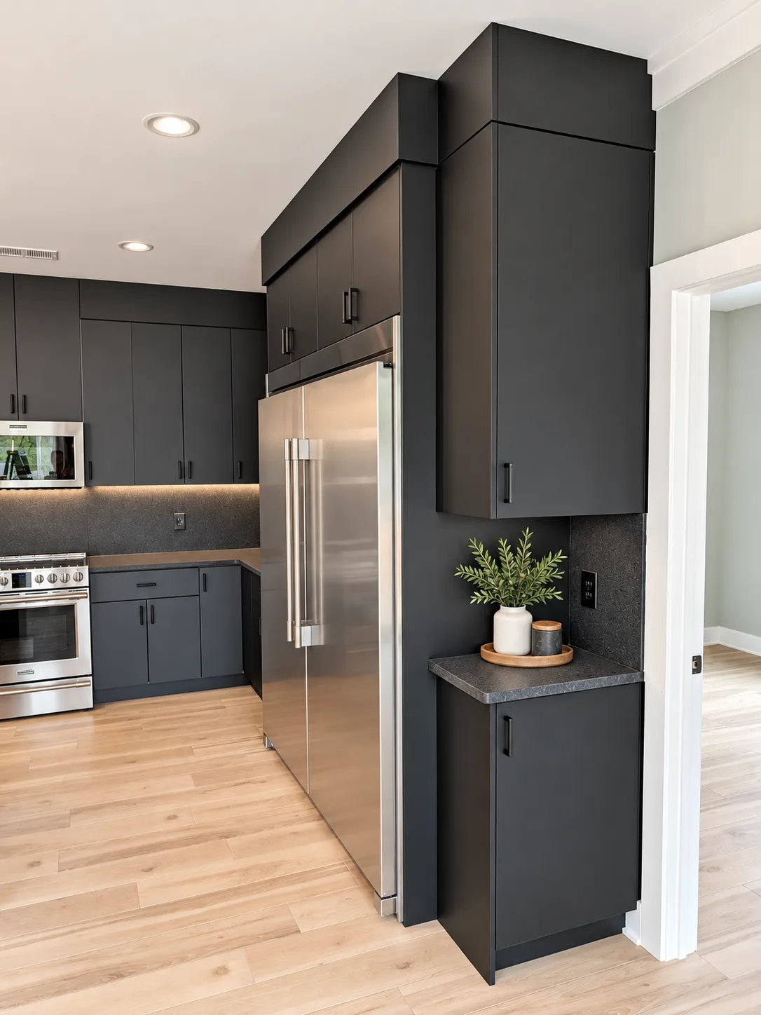 Black fridge column with microwave nook