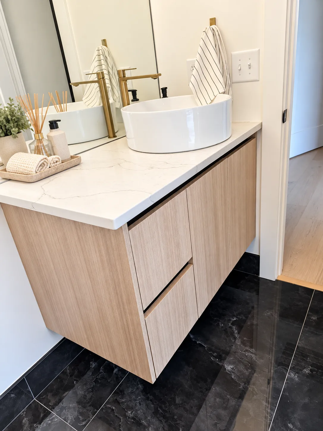 Floating Woodline vanity with vessel sink