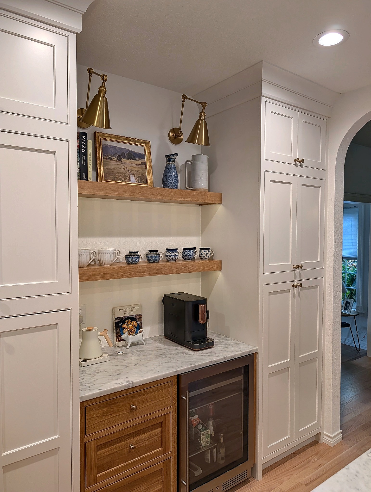 Dedicated coffee bar with floating oak shelves