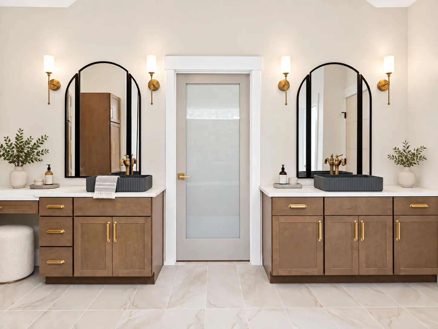 Twin Maker Series vanities in Element on Maple with arch mirrors