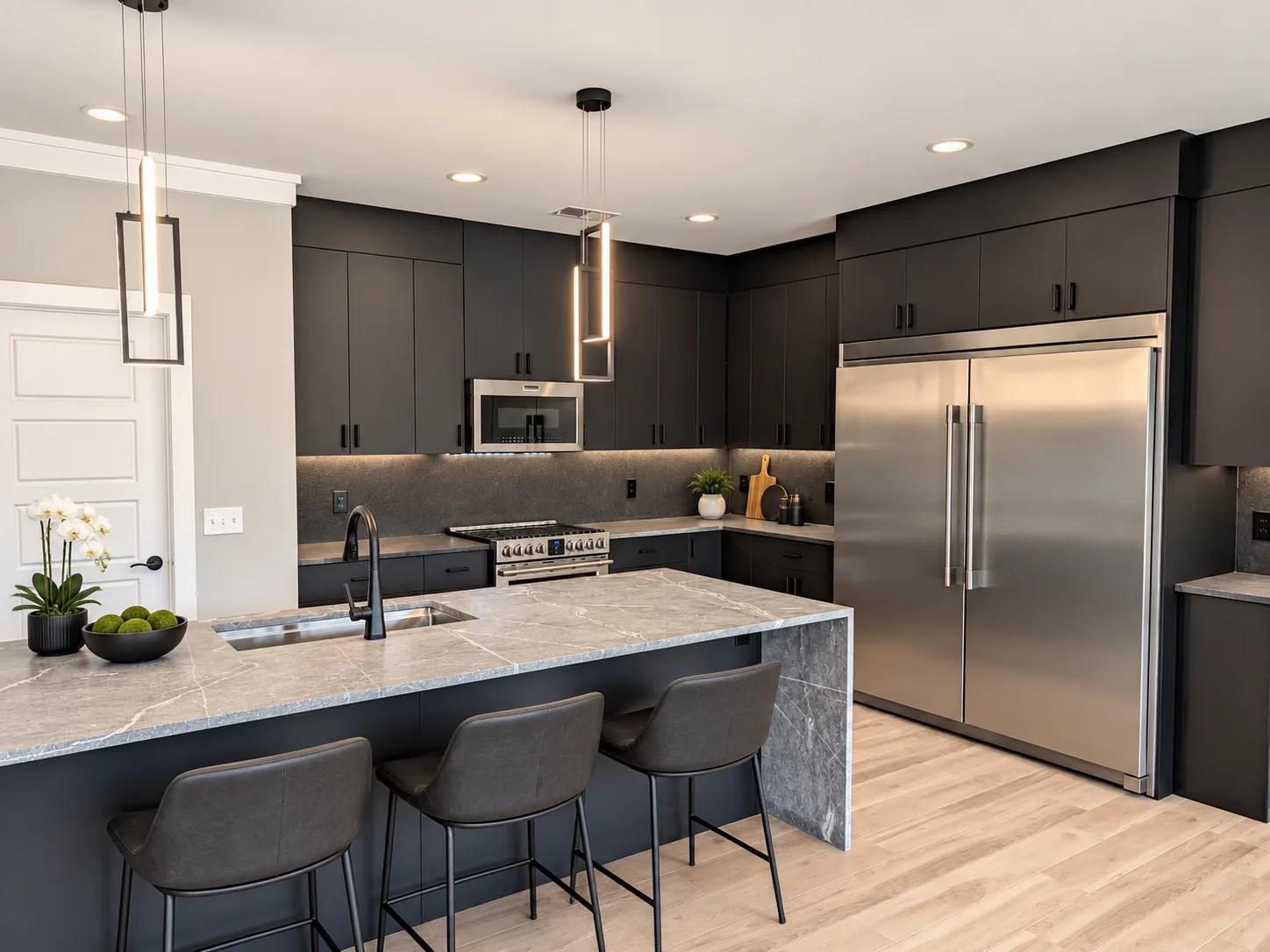 Metal Deco Black kitchen with island seating and integrated lighting