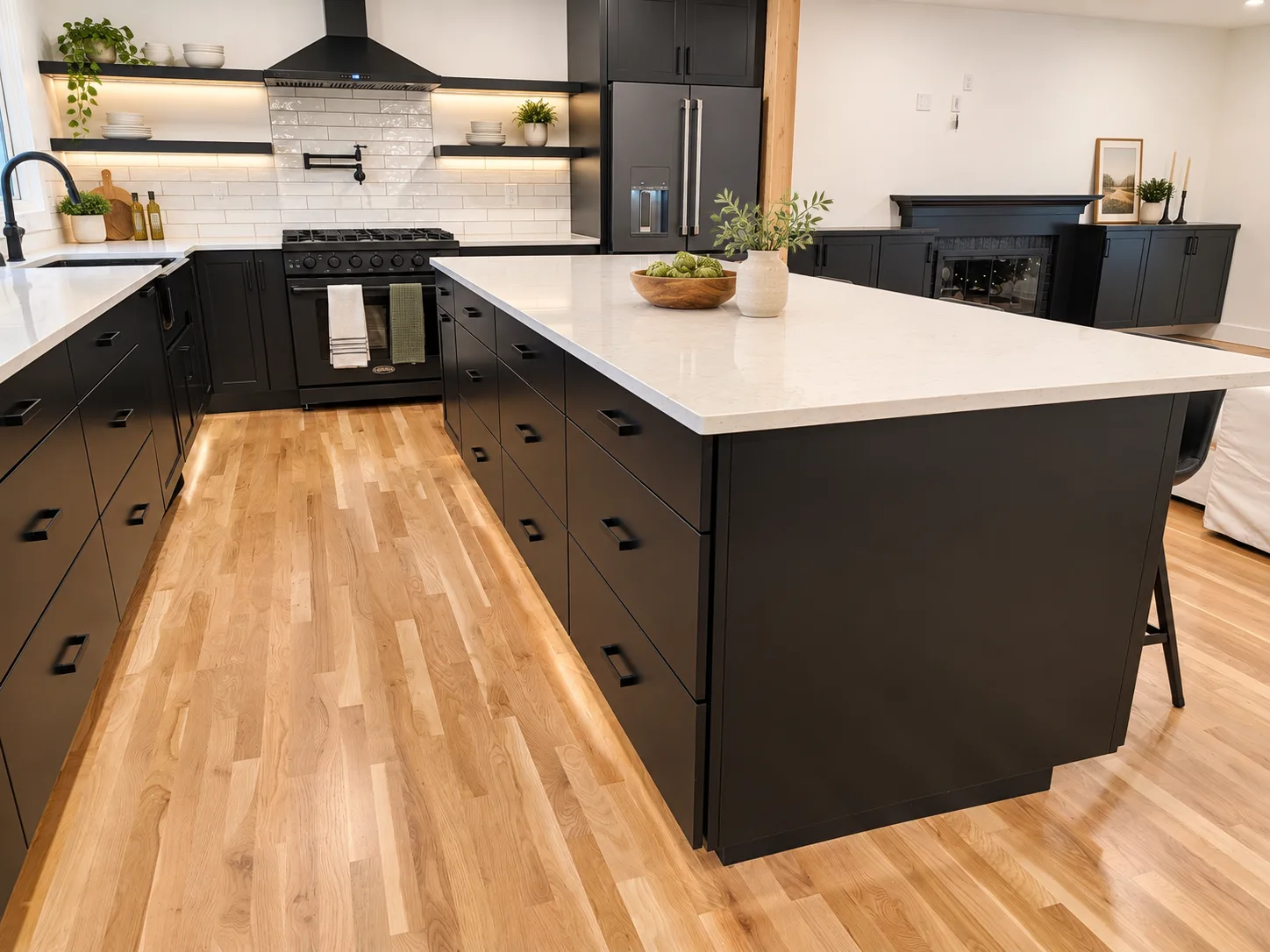 Quiet Black slab drawer island with under-counter lighting, Portland OR kitchen remodel