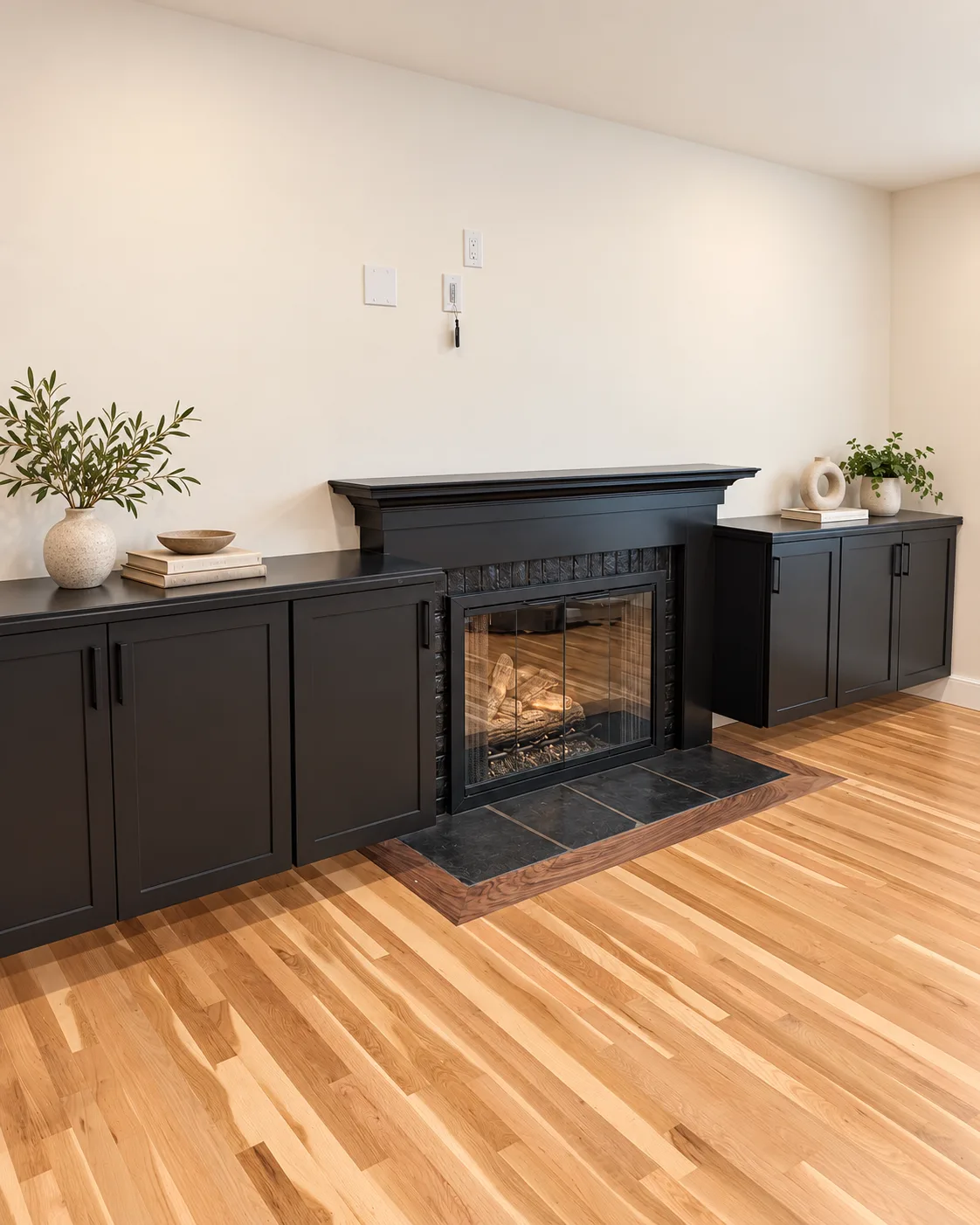 Custom black fireplace built-ins in Quiet Black finish, Portland Oregon remodel