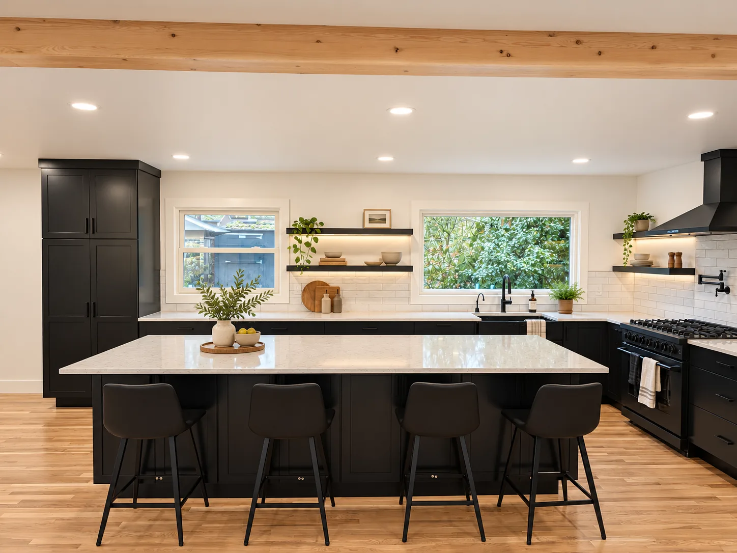 Kitchen sink wall with picture windows and lighted floating shelves, black cabinets, Portland OR