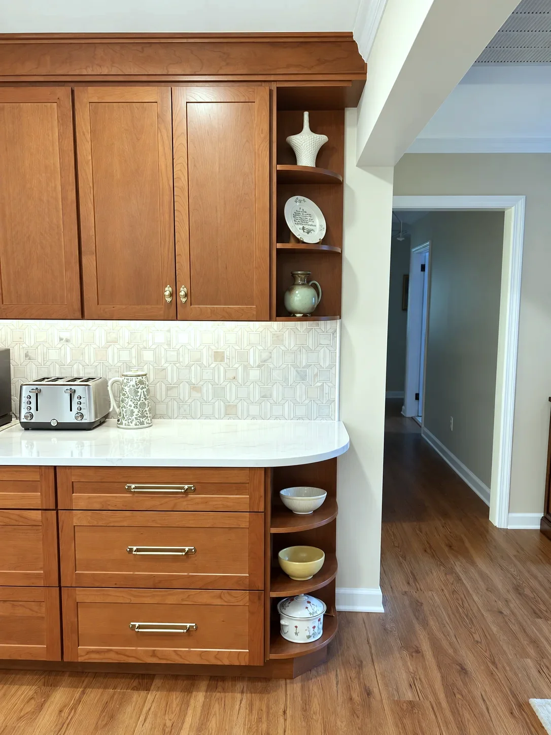 Curved open shelf cabinet end in Ugg stained cherry with mosaic backsplash, Georgia kitchen remodel