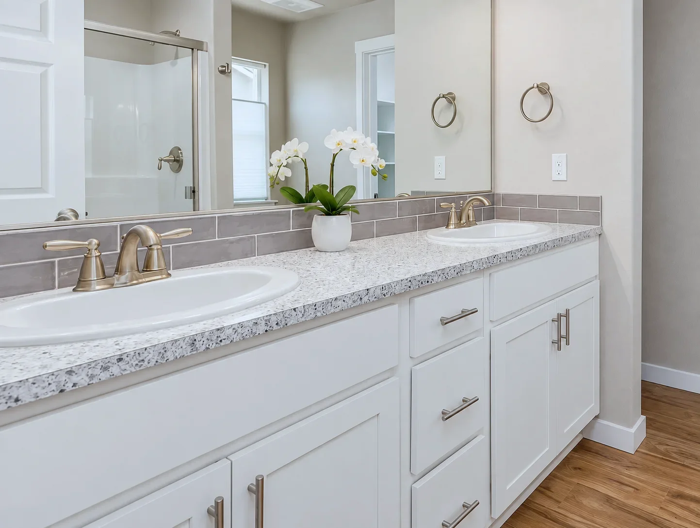 Double sink Bristol vanity in Alabaster with granite top, Kennewick WA spec home bath