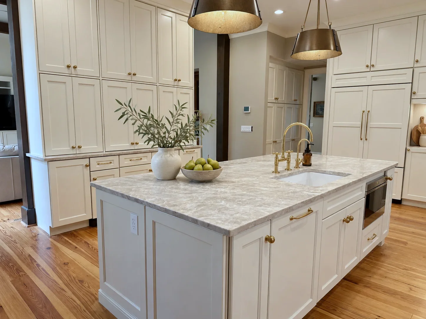 Custom appliance panels on the refrigerator wall with Awe painted Manchester cabinets, North Carolina remodel