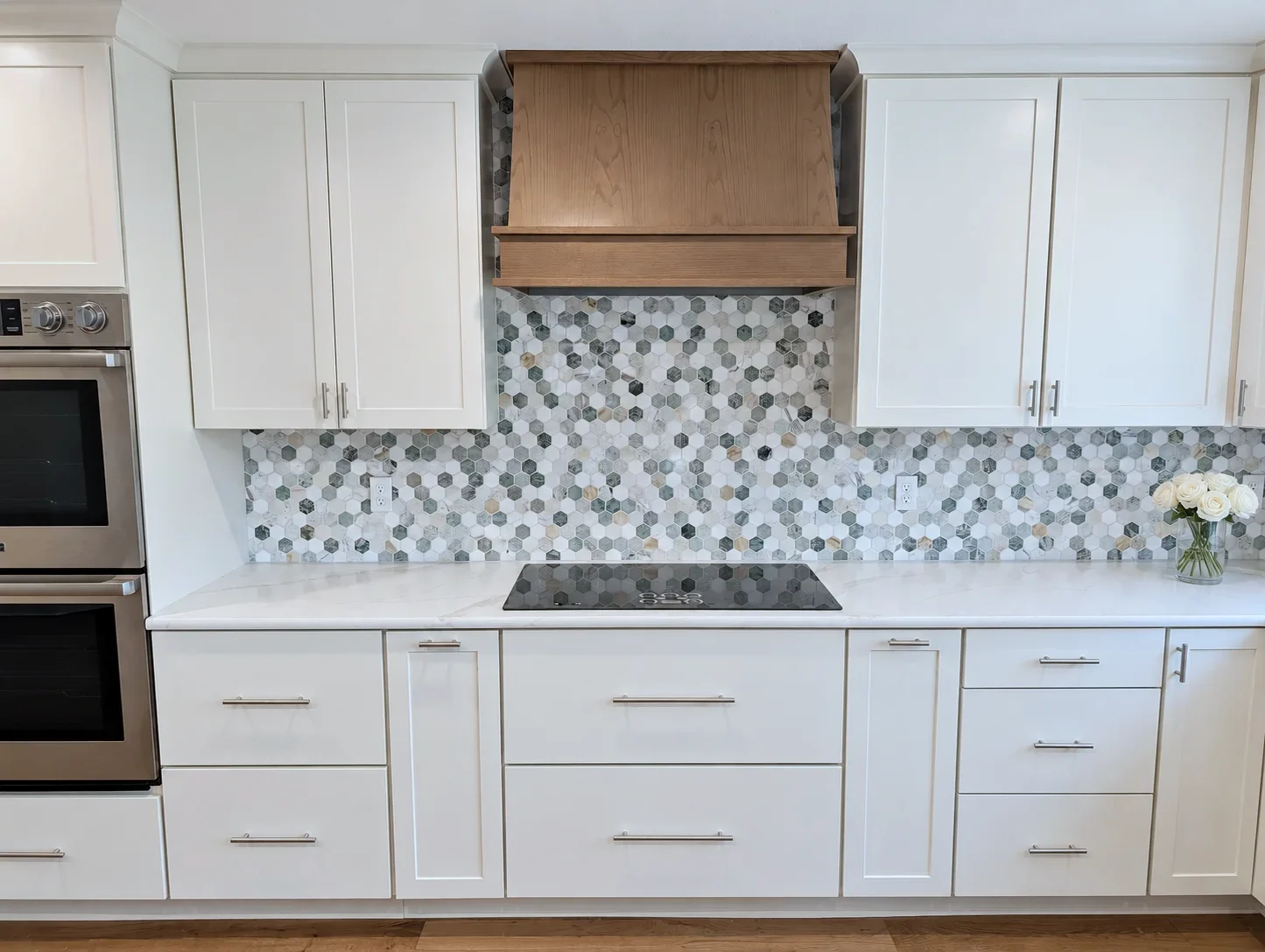 Cooktop wall with Element on Oak hood, hexagon tile and Blond cabinets, Oregon remodel