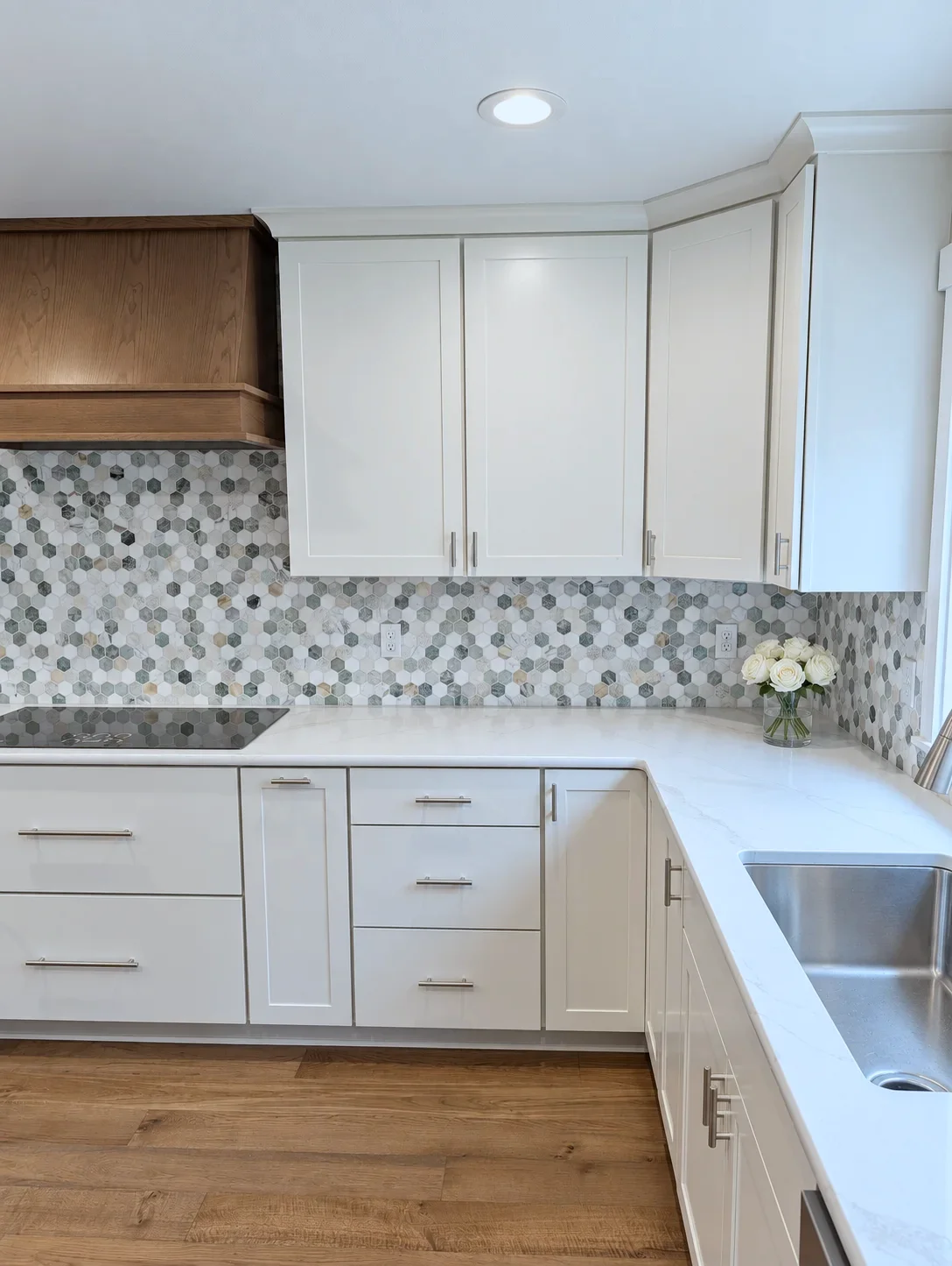 Corner cabinet run in Blond with the Element on Oak hood beyond, Oregon remodel
