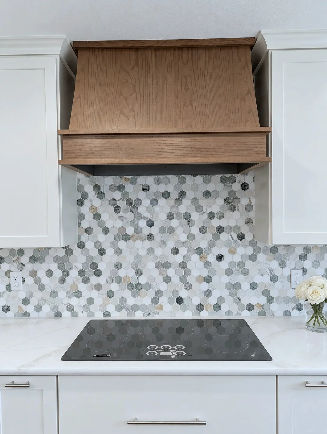 Element on Oak range hood over hexagon mosaic backsplash, Oregon kitchen remodel