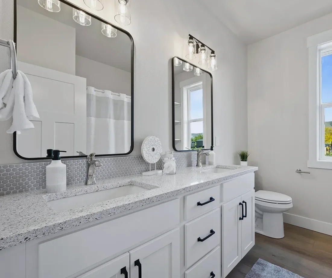 Hall bath double vanity in Alabaster Bristol with black hardware, Richland WA spec home