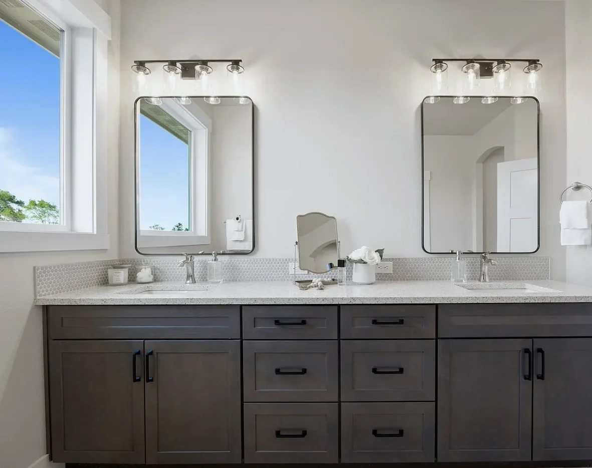Primary bath double vanity in Insight on Maple with framed mirrors, Richland WA spec home