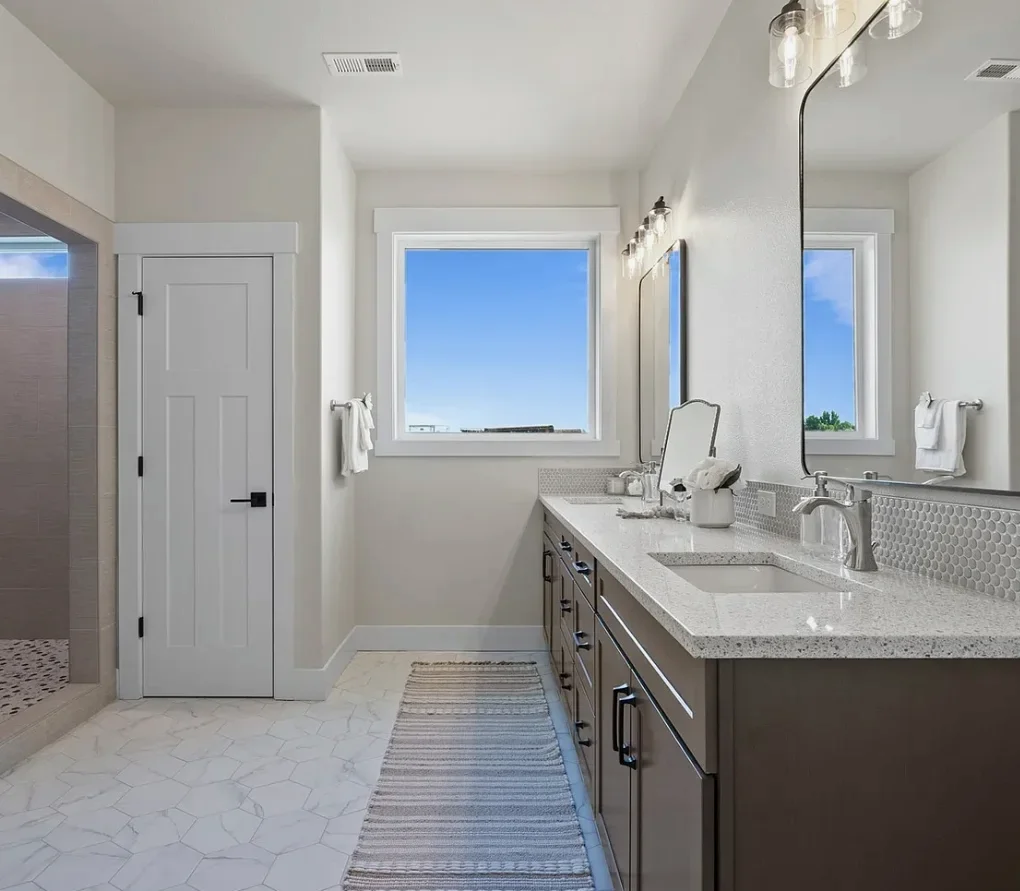 Primary bath with Insight on Maple vanity, walk-in shower and marble look tile, Richland WA spec home