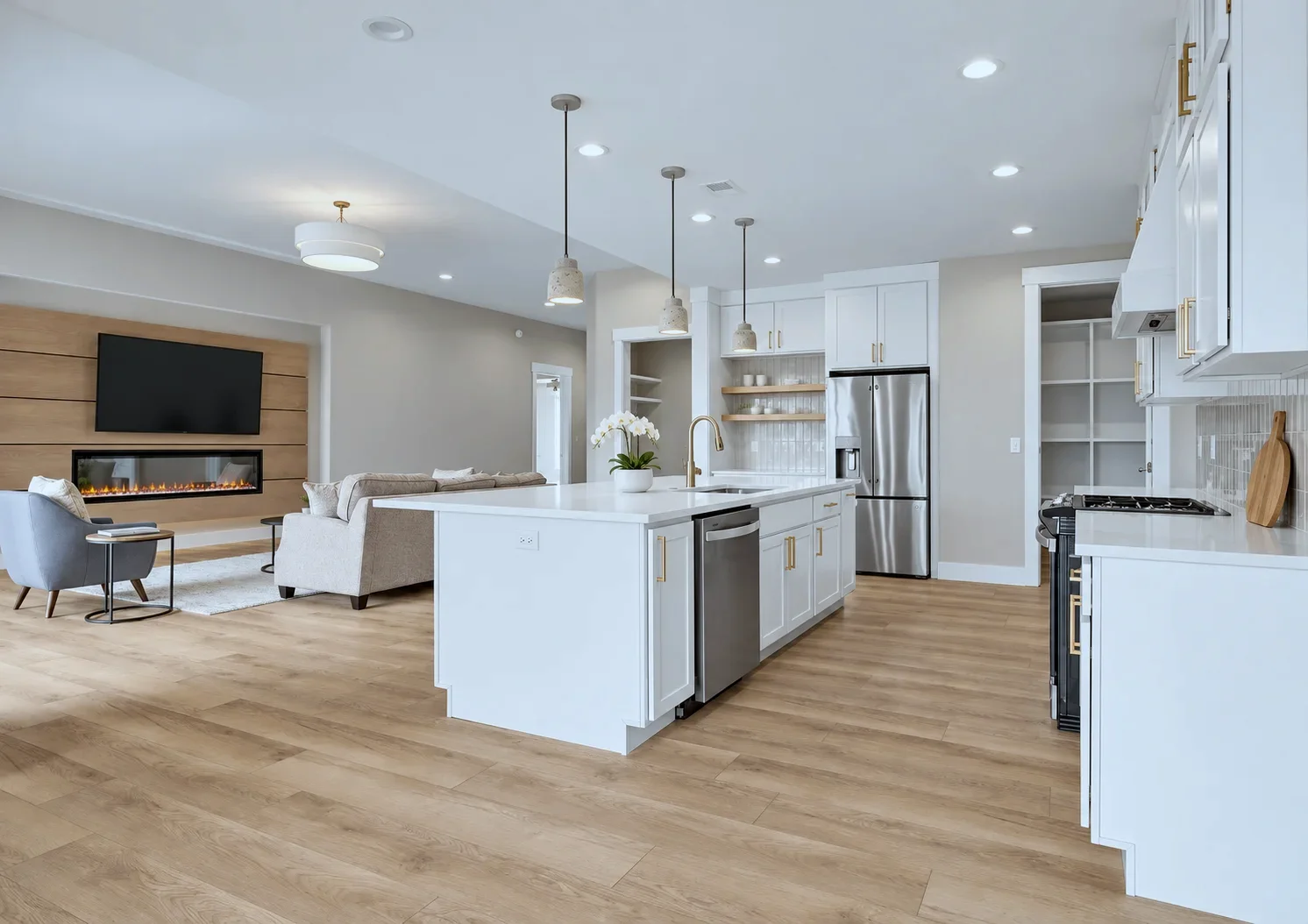 Open plan kitchen and living room with Alabaster cabinets and island, Taylors SC new construction