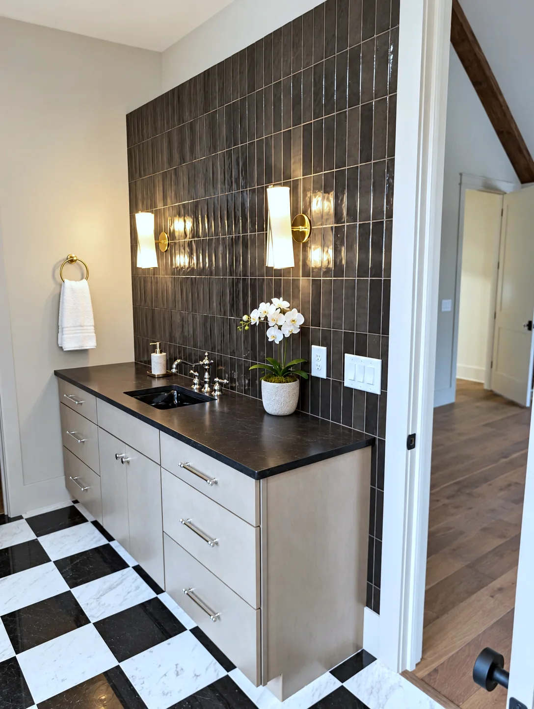 Powder bath vanity in Element on Maple with tiled accent wall, sconces and checkerboard floor, South Carolina